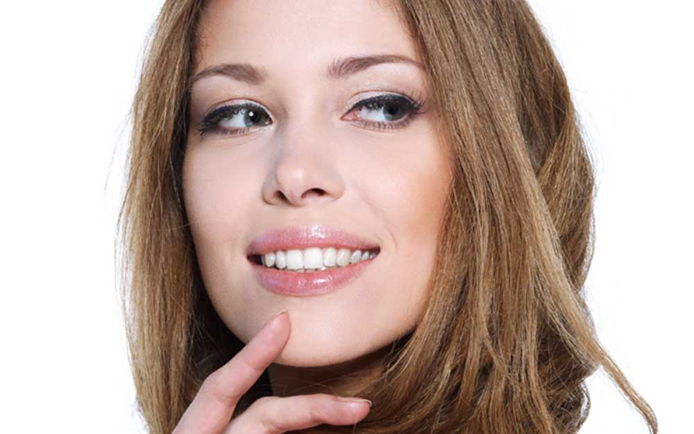 Dentist Near Me Totowa NJ 53 tooth-colored composite filling designed to restore damaged enamel with a natural, seamless appearance.