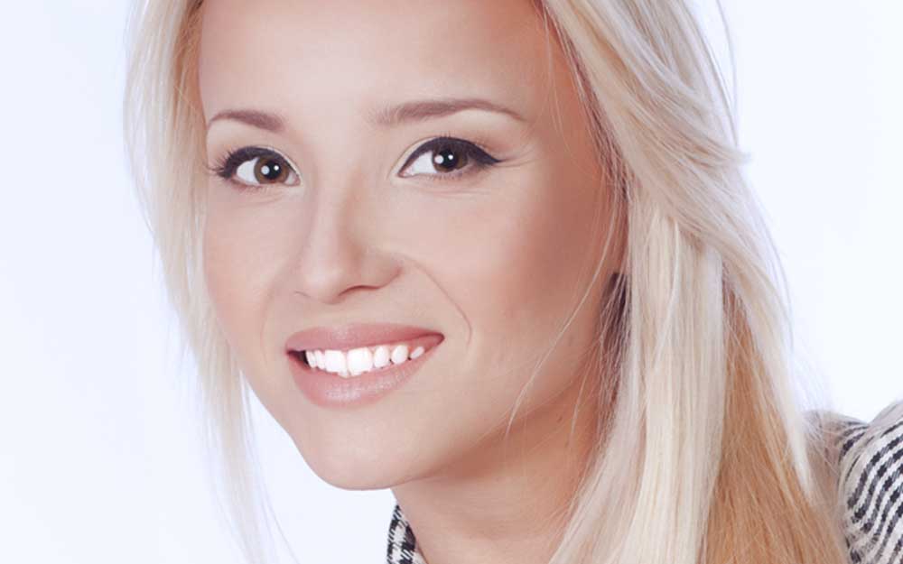 Dentist Near Me Totowa NJ 40 custom porcelain veneers featuring natural translucency, lifelike color, and precise contouring